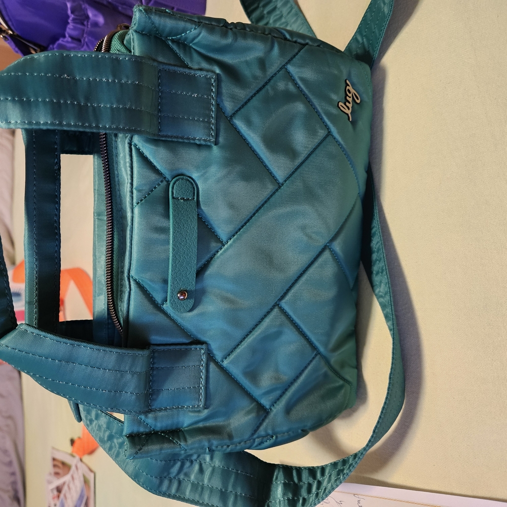 Lug Green Crossbody Bag with Silver Hardware and Relaxed Design